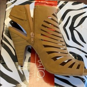 HOT tomato brown heels .